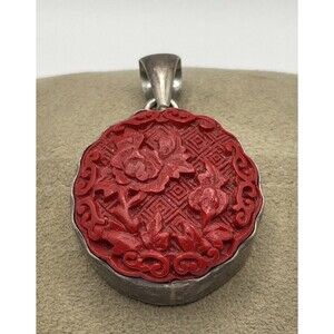 Large Charles Albert  Carved Floral Cinnabar Pendant Set In Fine Silver. NICE